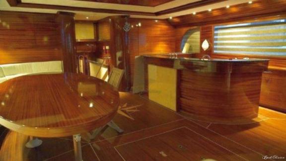 Elegant interior with bar and dining table on the 6-cabin gulet Şadiye Hanım in Marmaris.